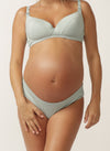 Close up of pregnant model wearing a blue gum nursing bra and bikini briefs