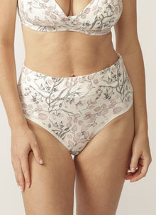  Close up of model wearing floral nursing bra and matching full brief with wide waist band