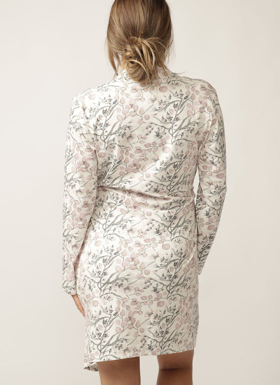 Back view of a pregnant model wearing floral lounge cardi
