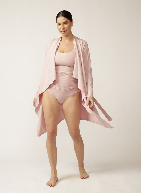 Model wearing pink lounge cardi with matching nursing cami and brief