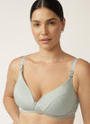 Close up of Model wearing sage green nursing bra 